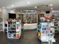 Omnicare Pharmacy Uphall & Travel Clinic.